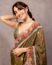 Stunning Kusha Kapila in a Green Silk Saree with Floral Embroidery and Sleeveless Blouse Photos 01
