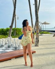 Stunning Nikita Sharma Cleavage in a Floral Bodycon Mini Dress Photos 03