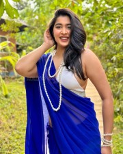 Stunning Nikita Sharma in a Blue Saree with White Blouse Photos 01