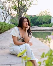 Stylish Actress Nikita Sharma in a White Off Shoulder Midi Dress Photos 02