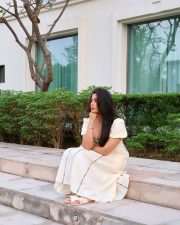 Stylish Actress Nikita Sharma in a White Off Shoulder Midi Dress Photos 03