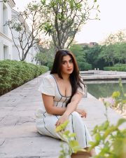 Stylish Actress Nikita Sharma in a White Off Shoulder Midi Dress Photos 04