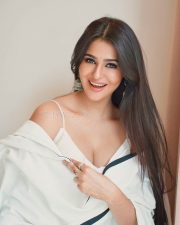 Stylish Prakriti Pavani in a Minimalist White Saree with a Contrasting Black Border and White Sleeveless Blouse Pictures 01