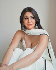 Stylish Prakriti Pavani in a Minimalist White Saree with a Contrasting Black Border and White Sleeveless Blouse Pictures 04