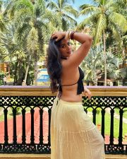 Sultry Nikita Sharma Cleavage in a Black Halter Top Yellow Skirt Photos 04