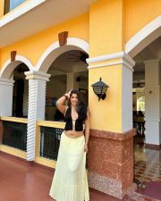 Sultry Nikita Sharma Cleavage in a Black Halter Top Yellow Skirt Photos 05