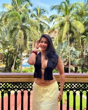 Sultry Nikita Sharma Cleavage in a Black Halter Top Yellow Skirt Photos 06