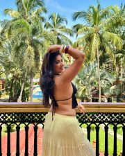 Sultry Nikita Sharma Cleavage in a Black Halter Top Yellow Skirt Photos 08