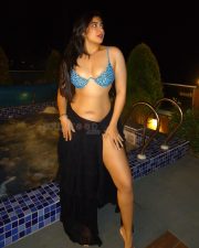 Tempting Actress Nikita Sharma in an electric blue printed bikini top with black sheer wrap photos 01