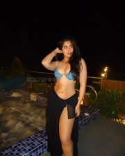 Tempting Actress Nikita Sharma in an electric blue printed bikini top with black sheer wrap photos 02