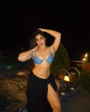 Tempting Actress Nikita Sharma in an electric blue printed bikini top with black sheer wrap photos 04
