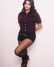 Tempting Prakriti Pavani in a Maroon Fine Knit Cardigan Short Sleeved Top with a High Waisted Black Mini Shorts and Sheer Black Tights Pictures 05