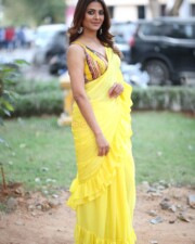 Actress Kashishh Rajput in a Yellow Saree with a Sleeveless Blouse Photos 01