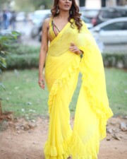 Actress Kashishh Rajput in a Yellow Saree with a Sleeveless Blouse Photos 16