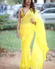 Actress Kashishh Rajput in a Yellow Saree with a Sleeveless Blouse Photos 16