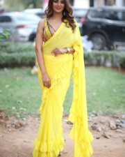 Actress Kashishh Rajput in a Yellow Saree with a Sleeveless Blouse Photos 17