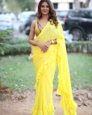 Actress Kashishh Rajput in a Yellow Saree with a Sleeveless Blouse Photos 18