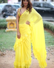 Actress Kashishh Rajput in a Yellow Saree with a Sleeveless Blouse Photos 23