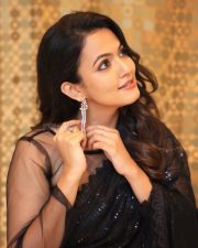 Beautiful Aparna Das in a Black Crystal Saree with Transparent Sleeveless Blouse Pictures 03