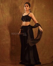 Beautiful Megha Shetty in a Black Embroidered Lehenga Set Photos 01