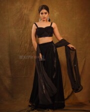 Beautiful Megha Shetty in a Black Embroidered Lehenga Set Photos 06