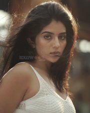 Beautiful Megha Shetty in a White Sleeveless Dress Photos 01