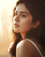 Beautiful Megha Shetty in a White Sleeveless Dress Photos 10