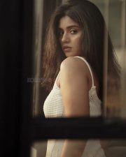 Beautiful Megha Shetty in a White Sleeveless Dress Photos 11