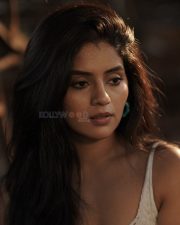 Beautiful Megha Shetty in a White Sleeveless Dress Photos 12