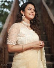 Dada Movie Actress Aparna Das in a Beige Saree with Pearl Work Blouse Photos 04