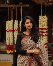 Elegant Actress Manasa Varanasi in a Orange Border Block Print Saree with Black Full Sleeve Blouse Photos 03