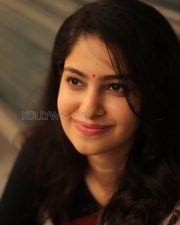 Elegant Actress Manasa Varanasi in a Orange Border Block Print Saree with Black Full Sleeve Blouse Photos 06