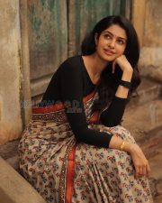 Elegant Actress Manasa Varanasi in a Orange Border Block Print Saree with Black Full Sleeve Blouse Photos 09
