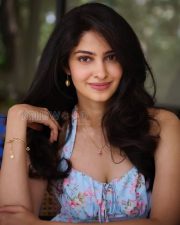 Enchanting Actress Manasa Varanasi in a Blue Floral Halter Midi Dress Photos 05