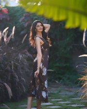 Main Hoon Kaun Heroine Manasa Varanasi in a Dark Brown Floral Printed Dress with a V Neckline and Lace Straps Photos 03