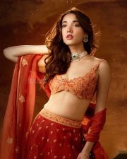 Actress Medha Shankr in a Traditional Orange Lehenga with Gold Floral Embroidery Photos 05
