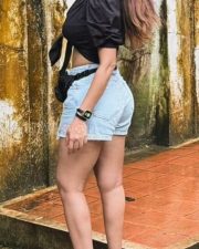 Sexaholic Actress Shama Sikander in a Mini Denim Shorts and Satin Black Top Photos 02