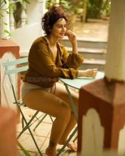 Adorable Megha Shukla in a Mustard Brown Shirt and Boy Shorts Photos 02