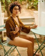 Adorable Megha Shukla in a Mustard Brown Shirt and Boy Shorts Photos 04