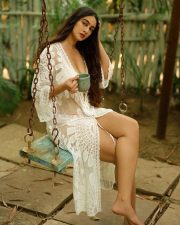 Bold Megha Shukla in a Two Piece White Bikini with a Floral See Through Cover Up Pictures 03