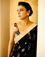 Bollywood Actress Kajol Devgan in a Blue Banaras Silk Saree with a Sleeveless Blouse Photos 01