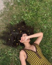Cute Kanika Mann in a Retro Yellow Striped Sleeveless Top Photos 04