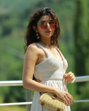 Cute Kanika Mann in a White Shoulder Straps Sleeveless Maxi Dress with Brown Boots Photos 01
