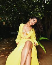 Dazzling Actress Roshni Walia in a lavender oversized jacket with black sports bra photos 08