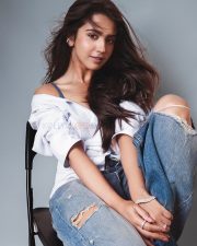 Dazzling Actress Roshni Walia in a white linen short sleeve button up shirt photos 02