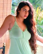 Enchanting Megha Shukla in a Green Sleeveless Midi Babydoll Dress Photos 03