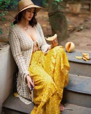 Erotic Beauty Megha Shukla Topless in a Crochet Top with a Flowy Yellow Skirt Photos 01