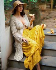 Erotic Beauty Megha Shukla Topless in a Crochet Top with a Flowy Yellow Skirt Photos 02