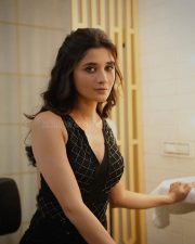 Fashionable Actress Kanika Mann in a black quilted halter neck dress photos 01