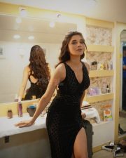 Fashionable Actress Kanika Mann in a black quilted halter neck dress photos 03